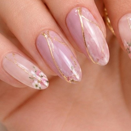 Pink marble nails with gold lines